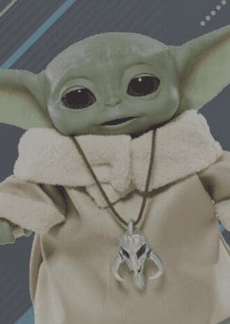 A close-up of a Baby Yoda (Grogu) toy or figure, wearing his iconic beige robe with a fluffy collar. Around his neck, he has a necklace with a silver pendant shaped like a mythosaur skull, a symbol from the Star Wars universe. The figure's large black eyes and expressive ears give it a cute and endearing appearance, capturing the likeness of the character from 'The Mandalorian' series.