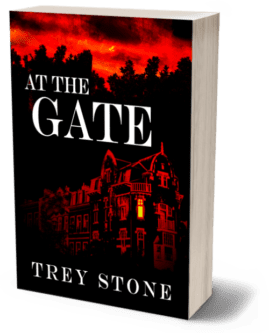 3D render of the book 'At the Gate' by Trey Stone. The cover features a dark, foreboding image of a large, ominous mansion with glowing red windows, set against a background of dense trees silhouetted by a fiery red and orange sky. The title 'At the Gate' is written in bold white letters at the top, standing out starkly against the dark background. The author's name, Trey Stone, is displayed at the bottom in white text. The overall design conveys a sense of suspense and horror, with the eerie lighting and ominous atmosphere suggesting a chilling, possibly supernatural story